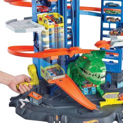 Alternative view of Hot Wheels City Robo T-Rex Ultimate Garage, Multi-level Multi-Play Mode, Stores 100 Plus 1:64 Scale Cars, Gift Idea for Kids 3 and Older